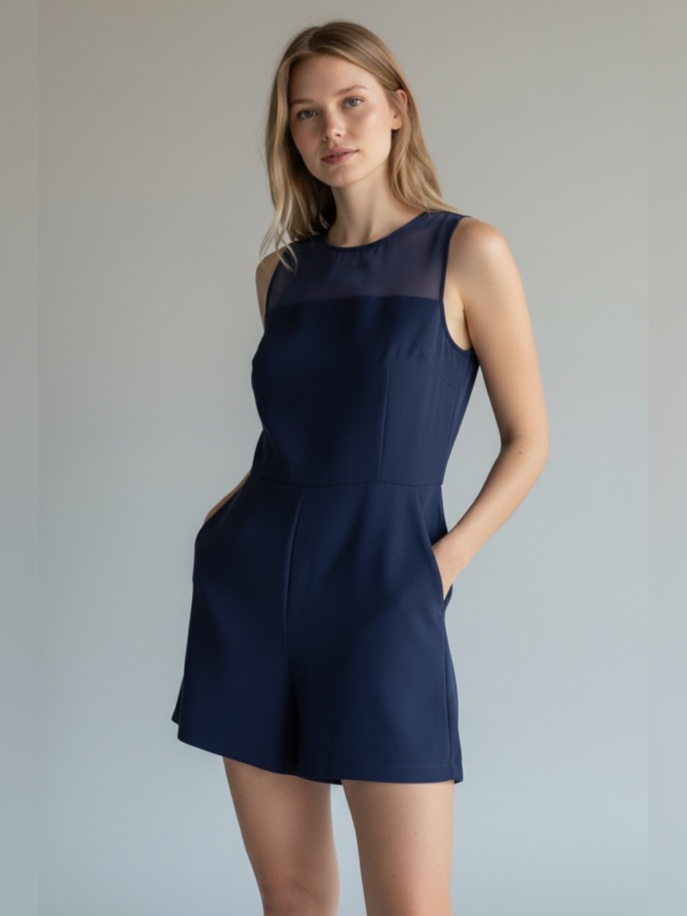 BCBGeneration Navy Sleeveless Romper with Sheer Yoke Panel